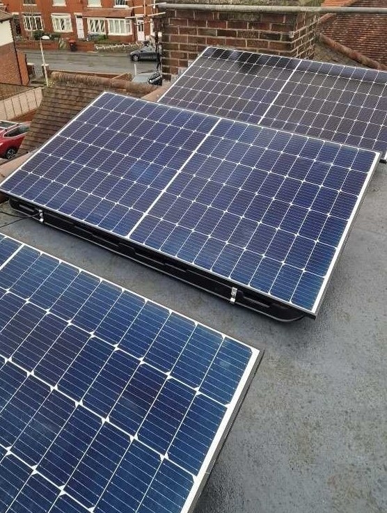 Solar panels on flat roof